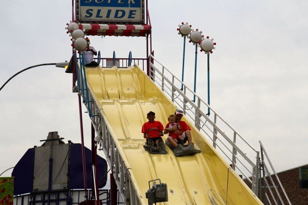 Kids race down the Super Slide to see who can make it down to the bottom of the slide first. 