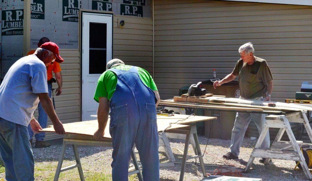 The mission work team from the United Methodist Church tackled the hot weather to get some progress done on their current job. 