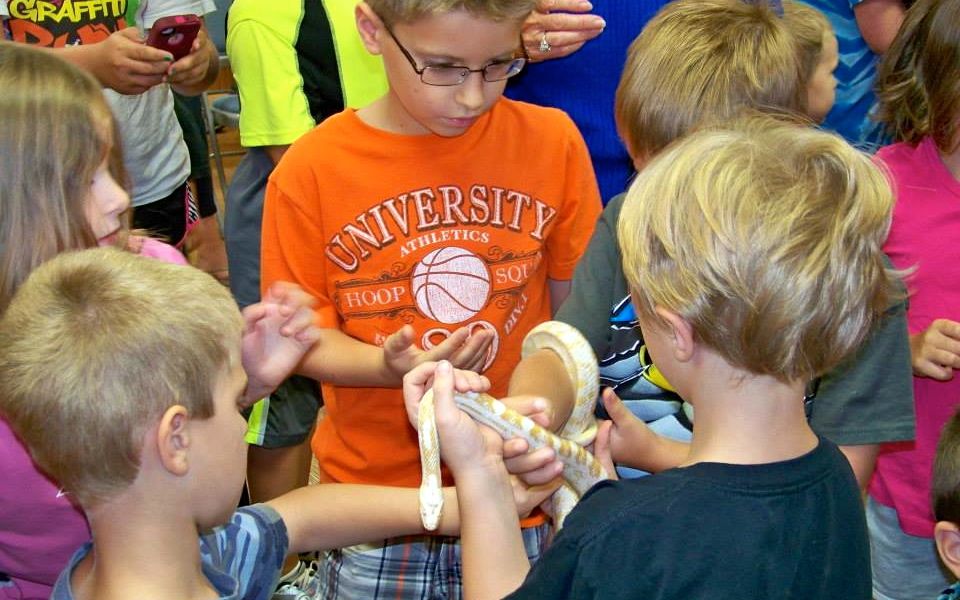 Youngsters at Benld Library were welcomed by Blackburn College's science department this week. They were able to see different snake species. 