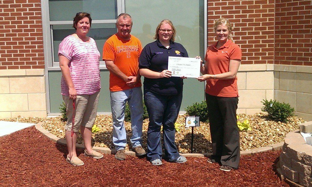 L-R: High school principal, Lori Emmons; FFA Advisor, Rick Spencer; Project Lead and GHS Senior, Shelby Heyen; and Judi Neese of the Farm Credit Jerseyville Office