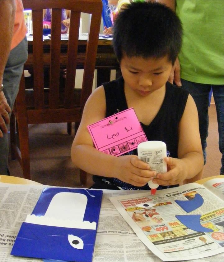 Leo Li and the rest of the readers at Gillespie Library made puppet sharks last week during story time. The library's summer program is wrapping up with only one session left in August. 