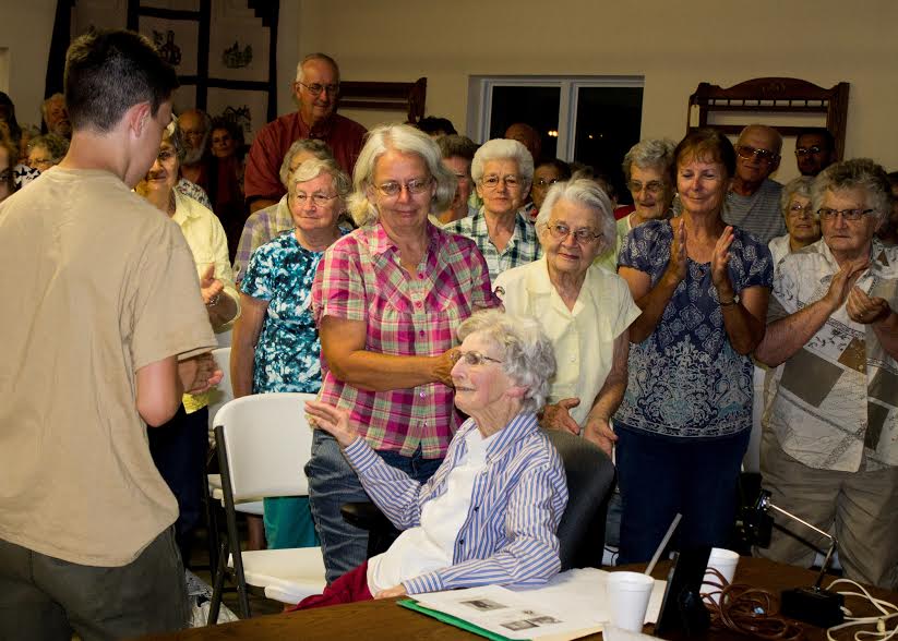 Josephine Remling, a founding member of the Macoupin County Historical Society, receives a standing ovation after her presentation at the society’s August meeting. (Contributed photo)