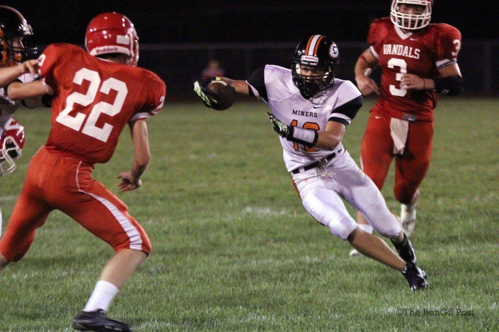 Bobby Carr fakes his opponent in Gillespie's loss to Vandalia. Carr reeled in 79 receiving yards last week.