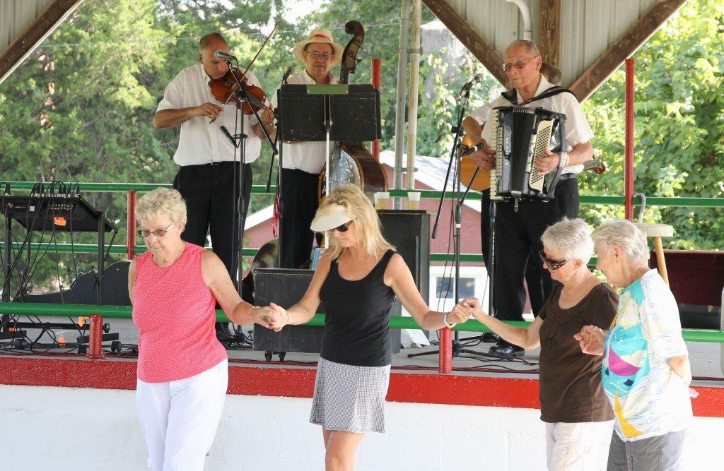 Dancers join hands and step together while the band plays at the 81st annual Croatian Picnic. 