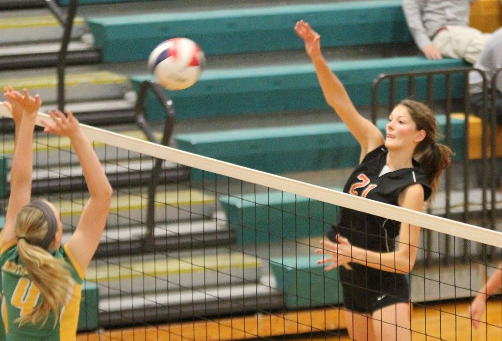 Shelsie Timmermeier spikes the ball over in Gillespie's loss to Piasa.
