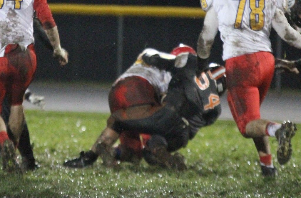 Jake Martin pulls an offender to the ground in Gillespie's seventh straight loss on the season. The Miners travel to Greenville next Friday. 