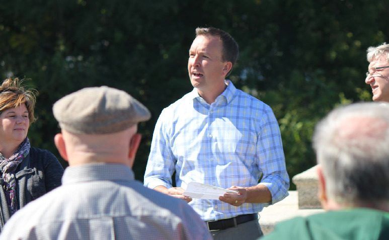 State Senator Andy Manar (center), Amy Rueff (left) and Tim Drea (right) of the AFL-CIO, announce a $43,000 state grant and a $70,000 contribution from the AFL-CIO to help fund the restoration project of the Mother Jones Monument.