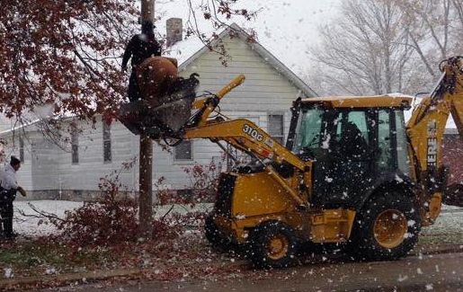 Benld Italian Club members hung Christmas decorations in downtown Benld last week. The lights will be lighted on Thanksgiving night. 