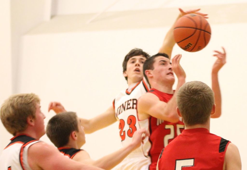 Josh Friese makes a block from behind in Gillespie's opening game in the Metro Thanksgiving Tournament. The boys lost to Morrisonville 68-72 in overtime.