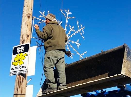 Volunteers and maintenance workers decorated the Village of Wilsonville with Christmas lights and holiday decorations last week. (Contributed photo)