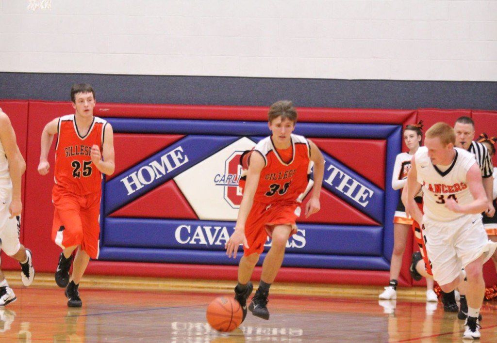Nick Price puts the ball on the floor after snagging the rebound in an effort to have numbers on the offensive end.