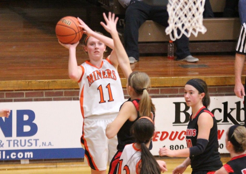 Amanda Schmidt scores over her defender from Nokomis in the third place game. 