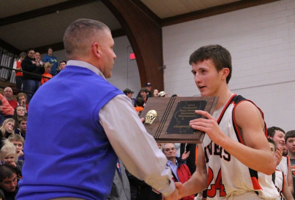 Evan Price accepts the first place title for Gillespie after the victory over Litchfield. 
