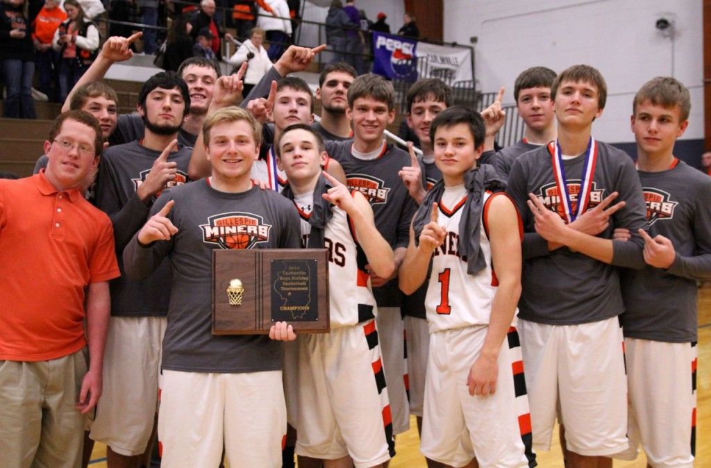 After accepting the first place title, the team poses for a group photo before celebrating in the locker room. 
