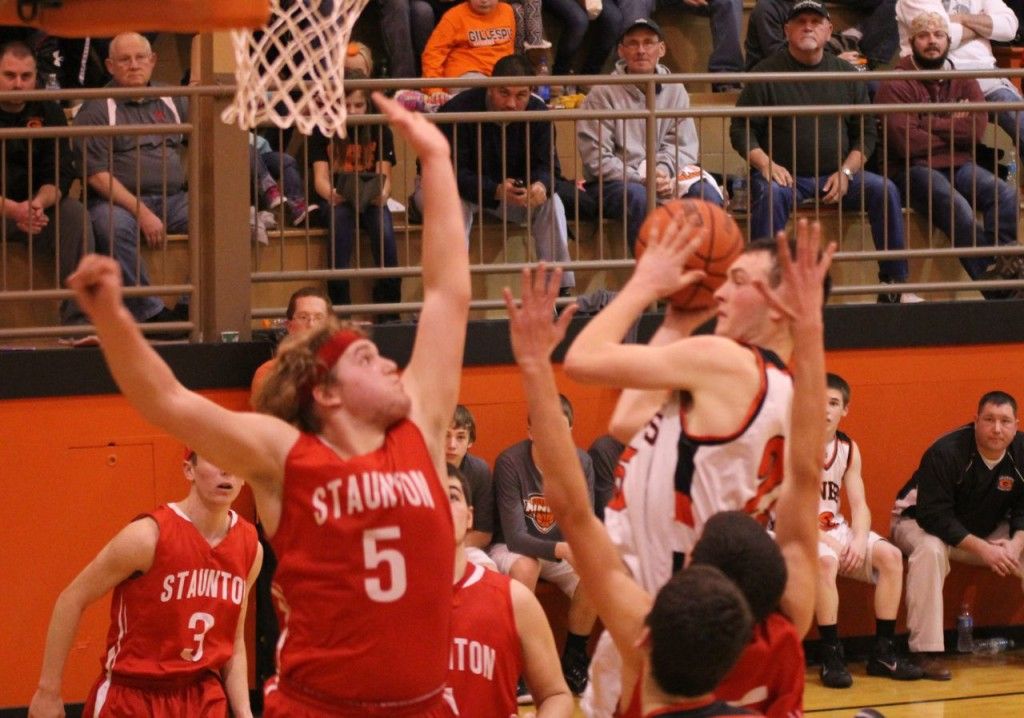 Jacob Alepra doesn't shy away from contact and scores two points for the Miners.