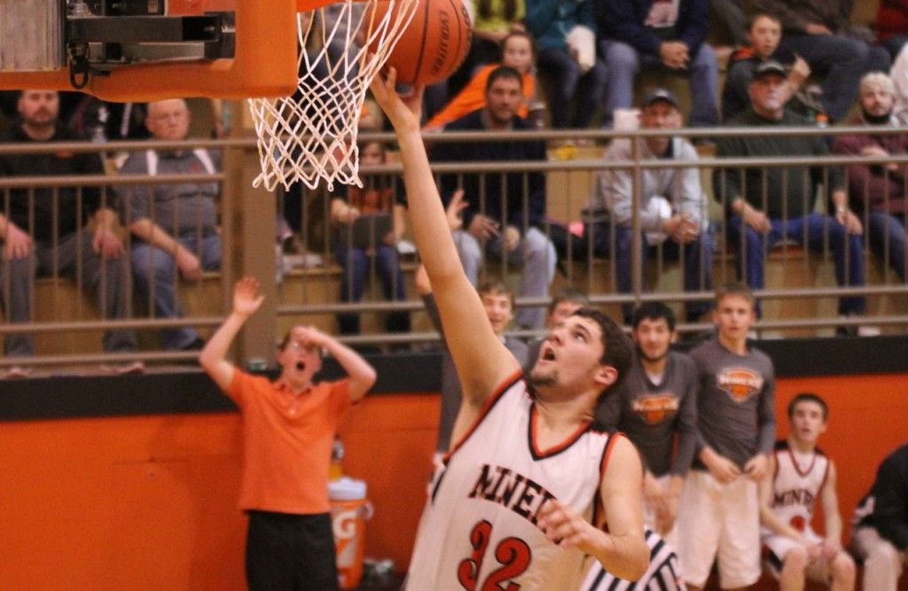 Quentin Zenner takes it easy on the rim after deciding to just finish with a layup.