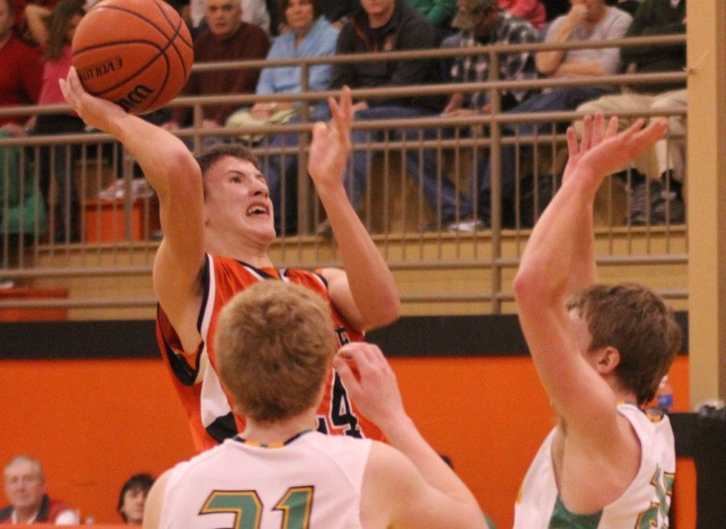 Evan Price scores on a fade away shot. 