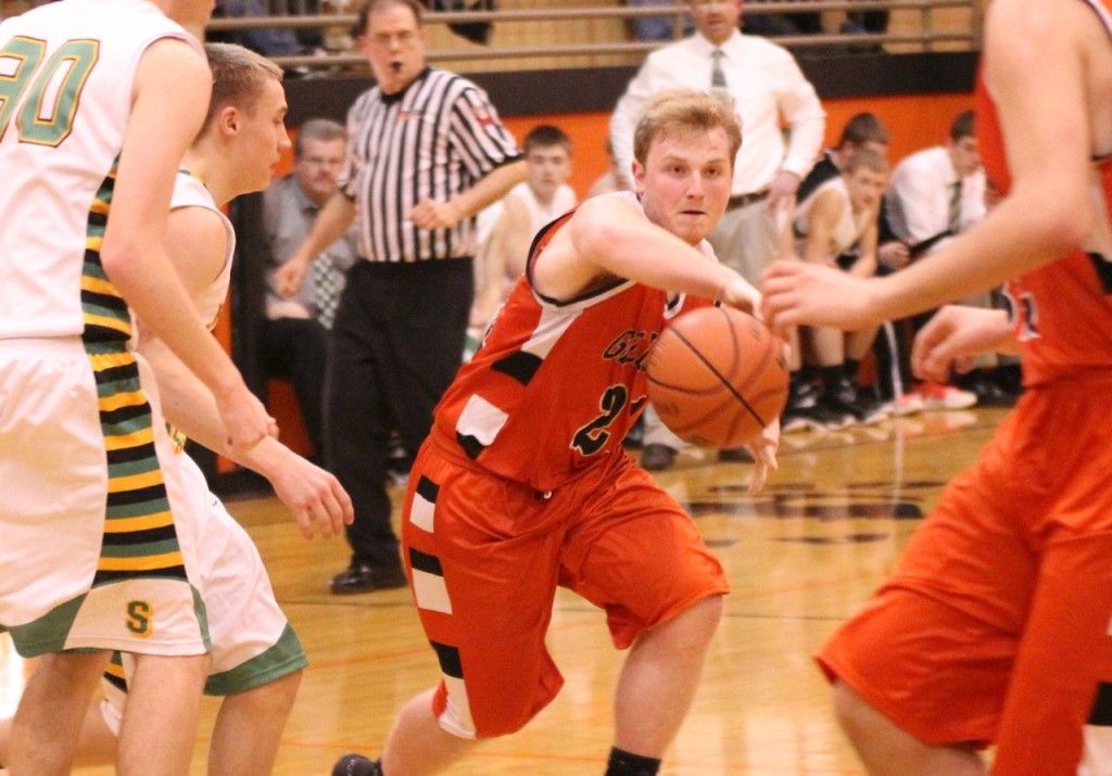 Eli Fox makes a pass to his teammate in the middle of the lane. The Miners lost the championship to finish 2nd in the tournament. 