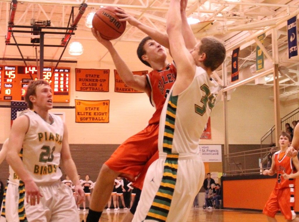 Evan Price draws his defender out to shoot a layup while forcing a blocking foul for an old fashioned three point play. 