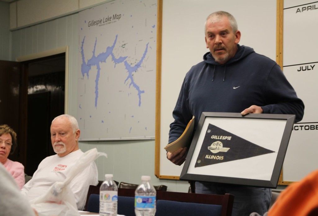 Gary Thornhill requests to form a Lake Committee and shows off a flag dating back to the 1950's that committee members used to have. 