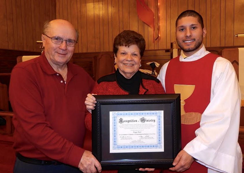 Benld United Methodist Church celebrated the ministry of Peggy Zarr last week after Peggy retired from teaching Sunday School at Benld UMC after 53 years.  Pictured: Harry Craddick, Lay Leader; Peggy Zarr; Rev. Ethan Carnes, OSL. (Contributed photo/Benld United Methodist Church)