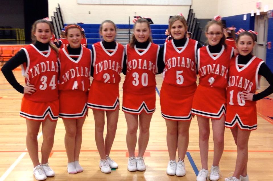 The Gillespie Middle School 8th grade cheerleaders pose for a group photo on "8th Grade Night" last week. 