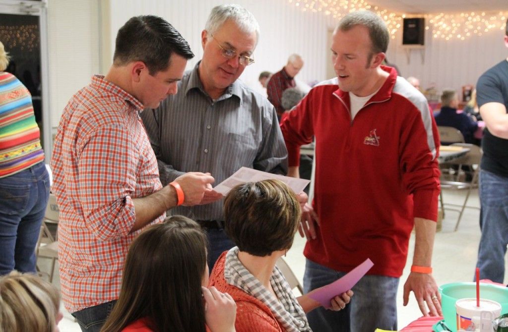 Jeff and Dick Drew try to name the album covers along with Jim Wilson (right). 