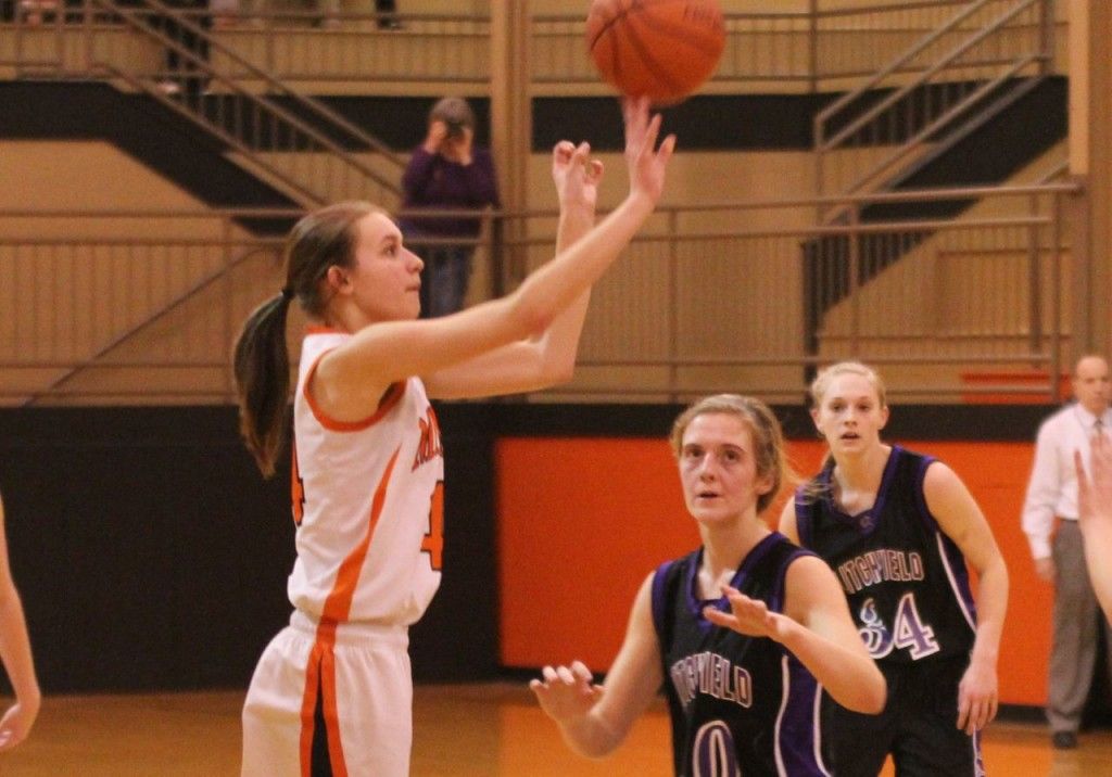 Abbie Barber shoots and scores for the Lady Miners in their loss to the Litchfield Panthers. 