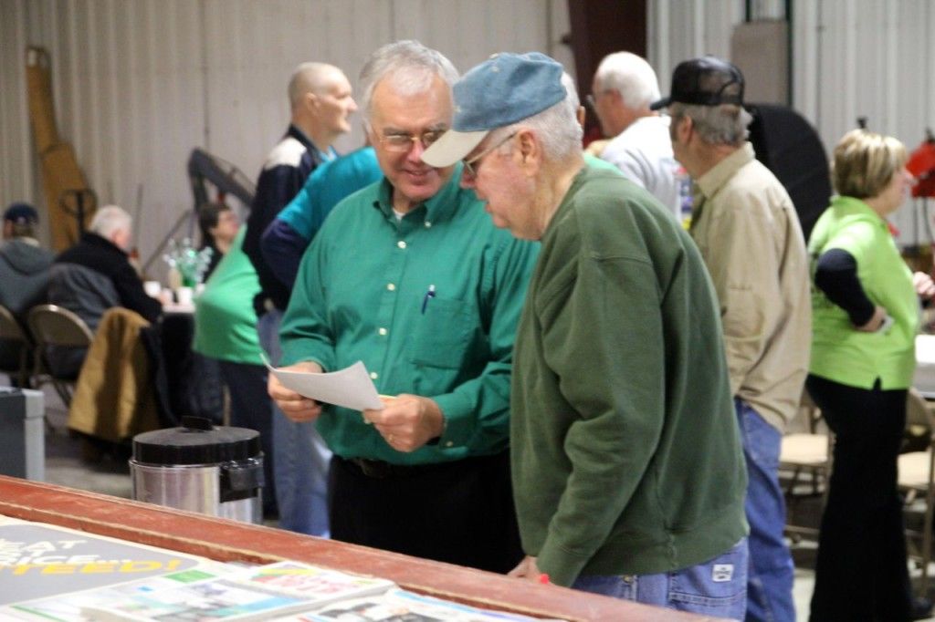 Dick Drew talks with a customer. 