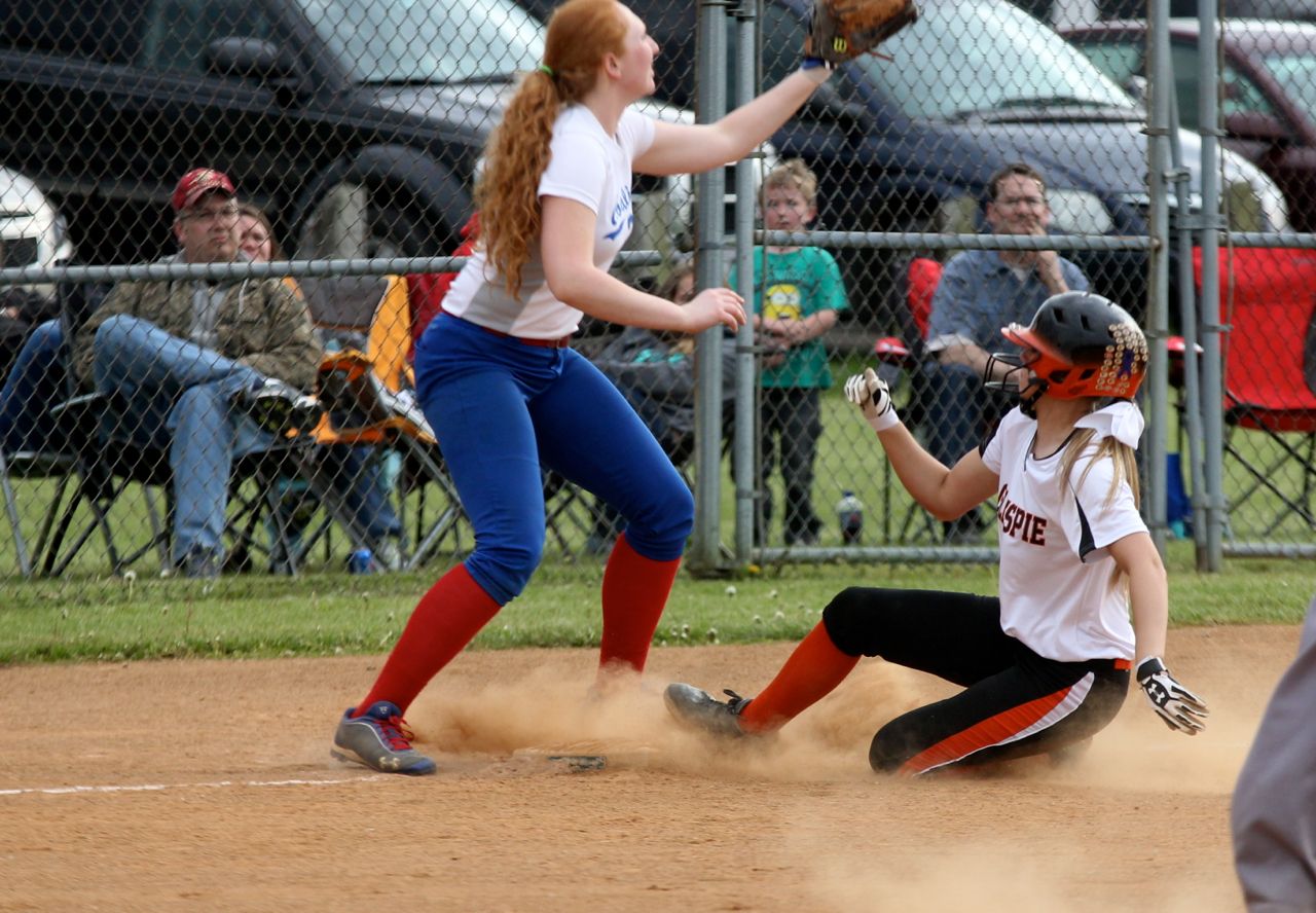 Addison Bryant slides into third base on a triple. The Miners beat the Cavaliers 3-1 last week.