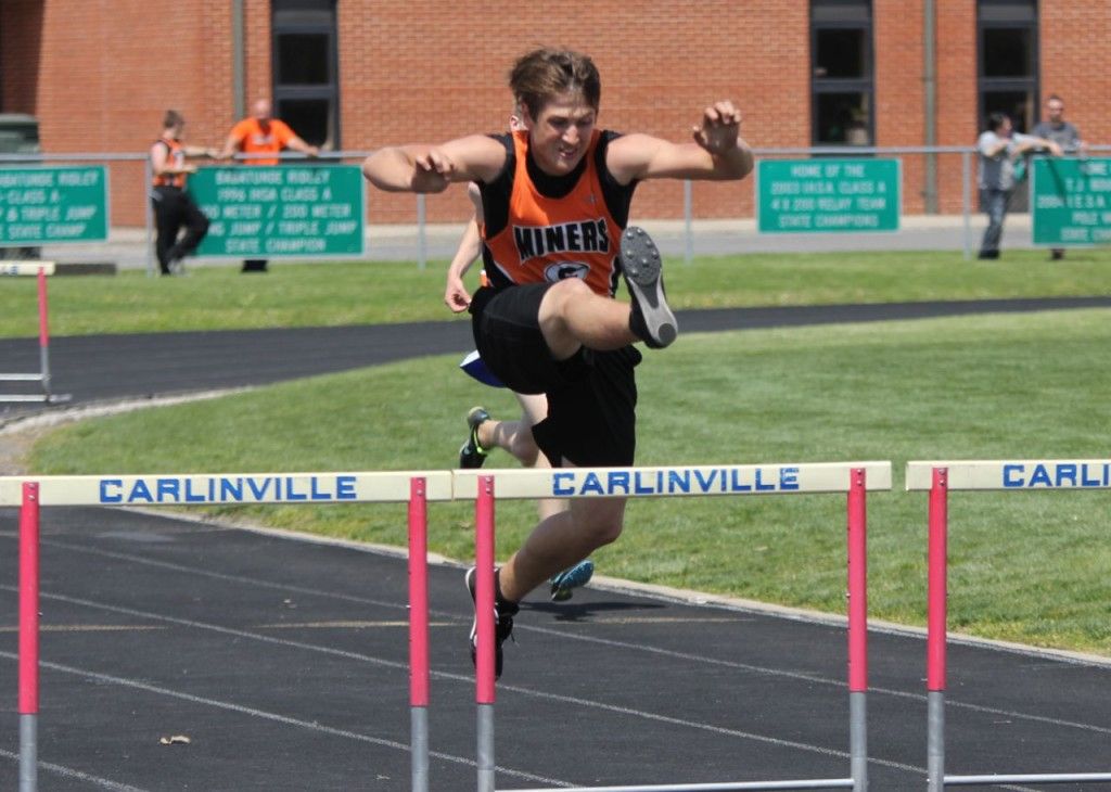Bobby Carr clearing the hurdle.