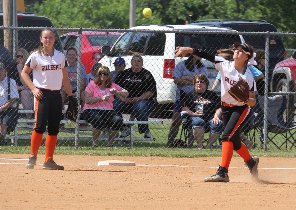Shortstop Beth Fields makes the putout on first after fielding the ground ball. 