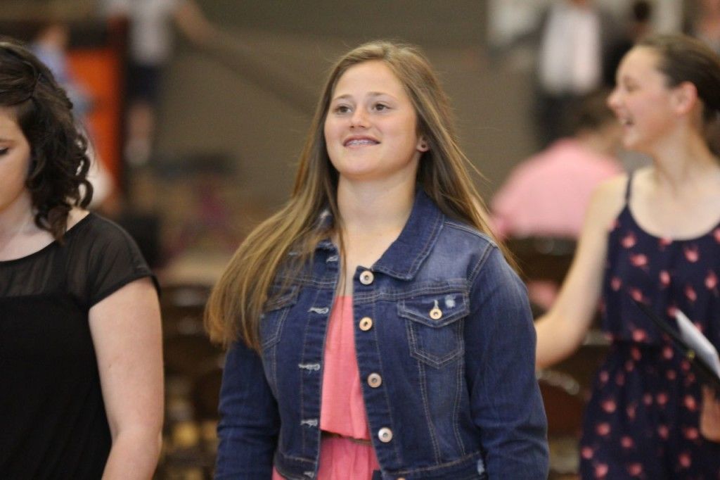 Ashley Gipson smiles as the students exit the promotion ceremony. 