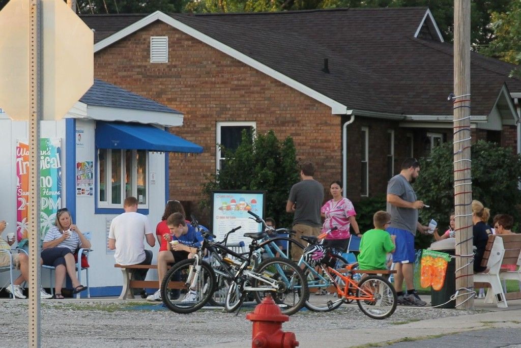 Tropical Sno was crowded with people last Thursday afternoon. The tasty shaved ice stand has hundreds of flavors to choose from.