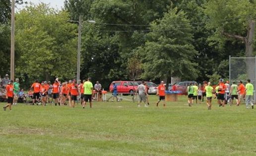 Kittenball teams at the Dorchester Homecoming rotate after the third out. (Photo by the Village of Dorchester)