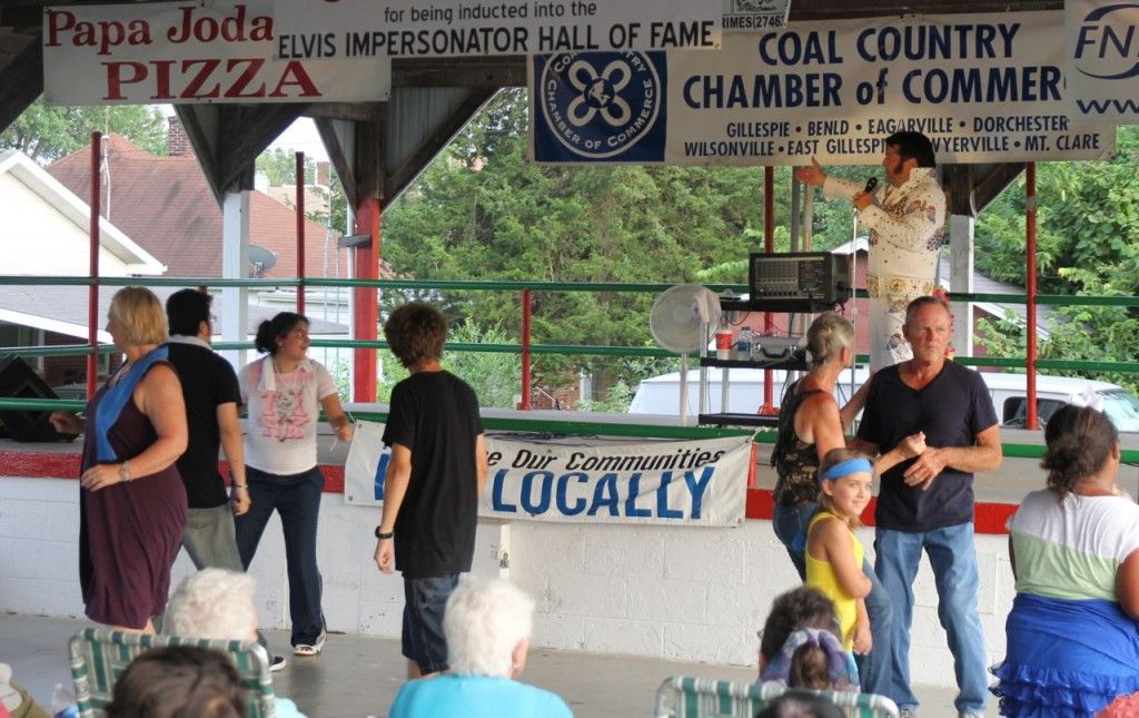 Steve Davis as Elvis entertains the crowd at the Coal Country Chamber of Commerce's summer concert held Tuesday. 