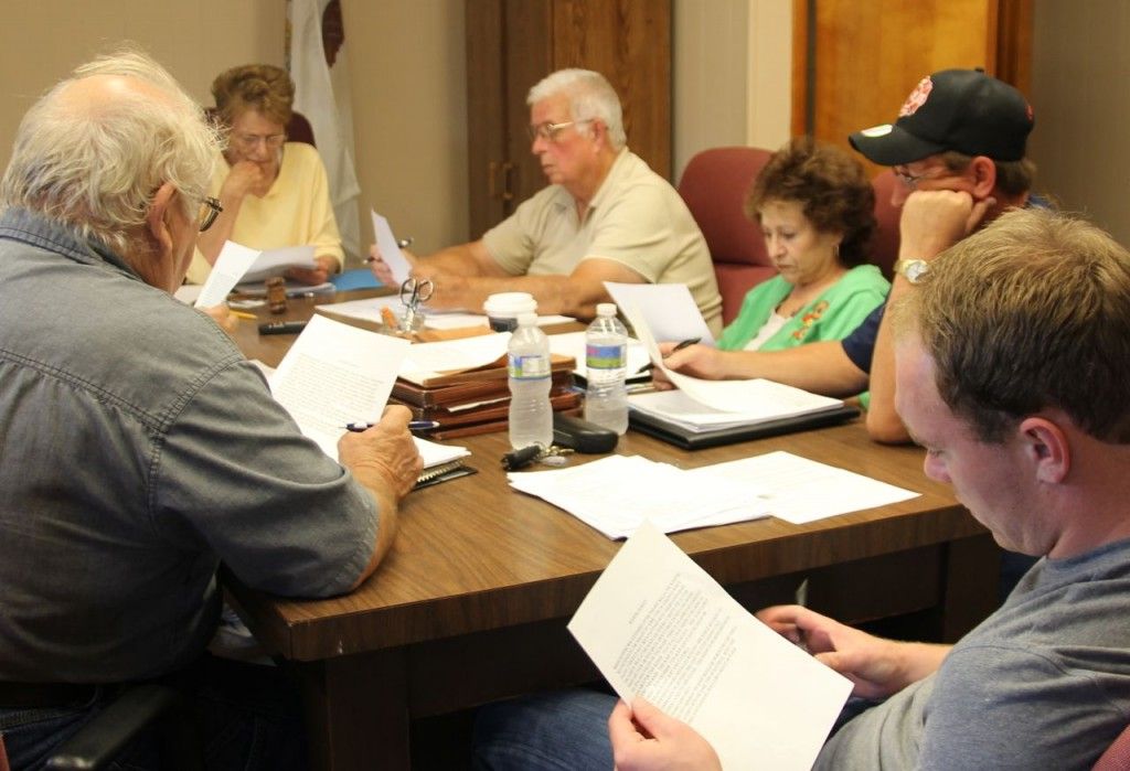 Benld council members review Richard Sereg's letter regarding the Nutrition Center.