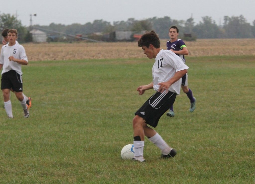 Jack Jarman controls the ball to setup an offensive play. 