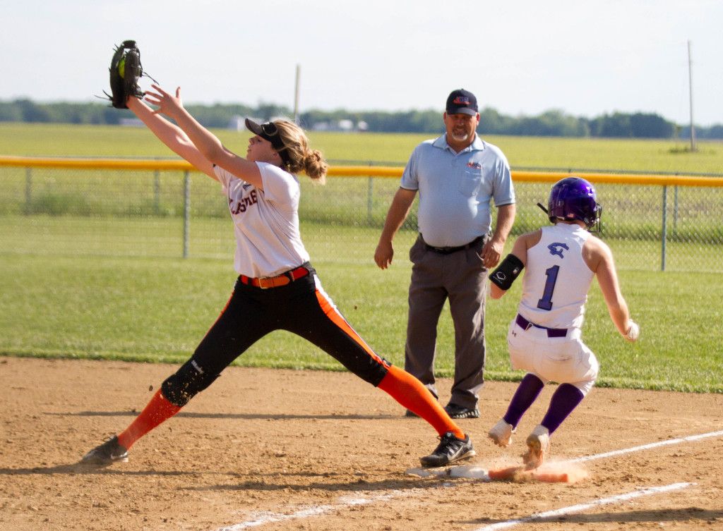 Rylee Sarti stretches on first base to record the out. 
